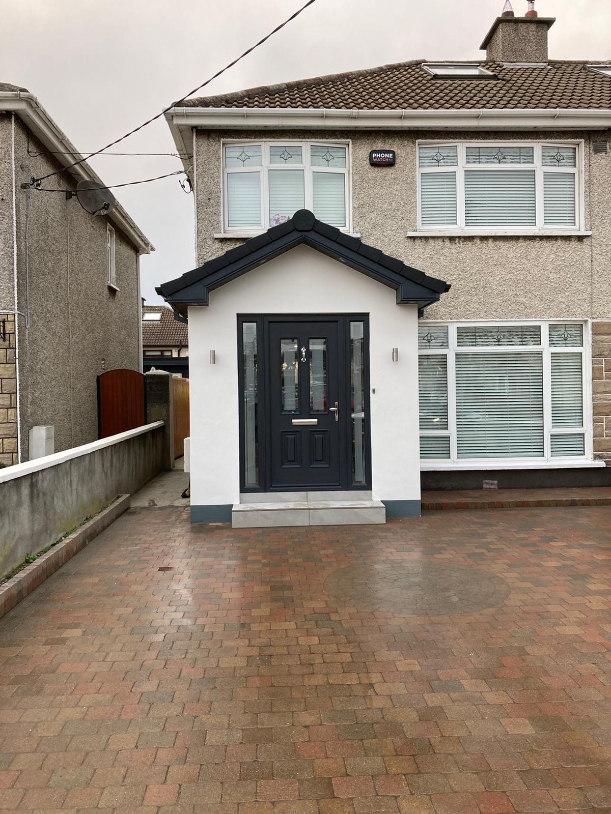 New rendered front porch with anthracite composite door and block-paved driveway